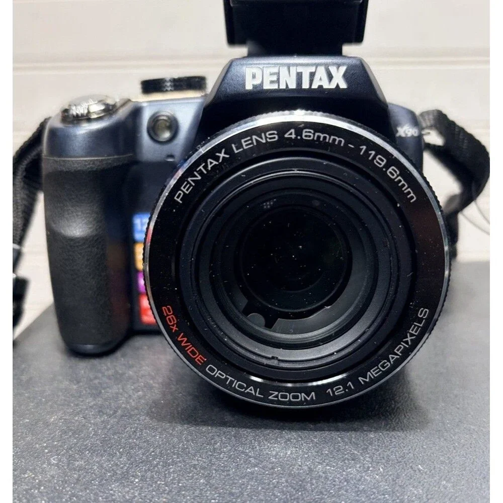 Pentax X90 12.1MP Digital Bridging Camera w/manual, Battery, Charger & Strap